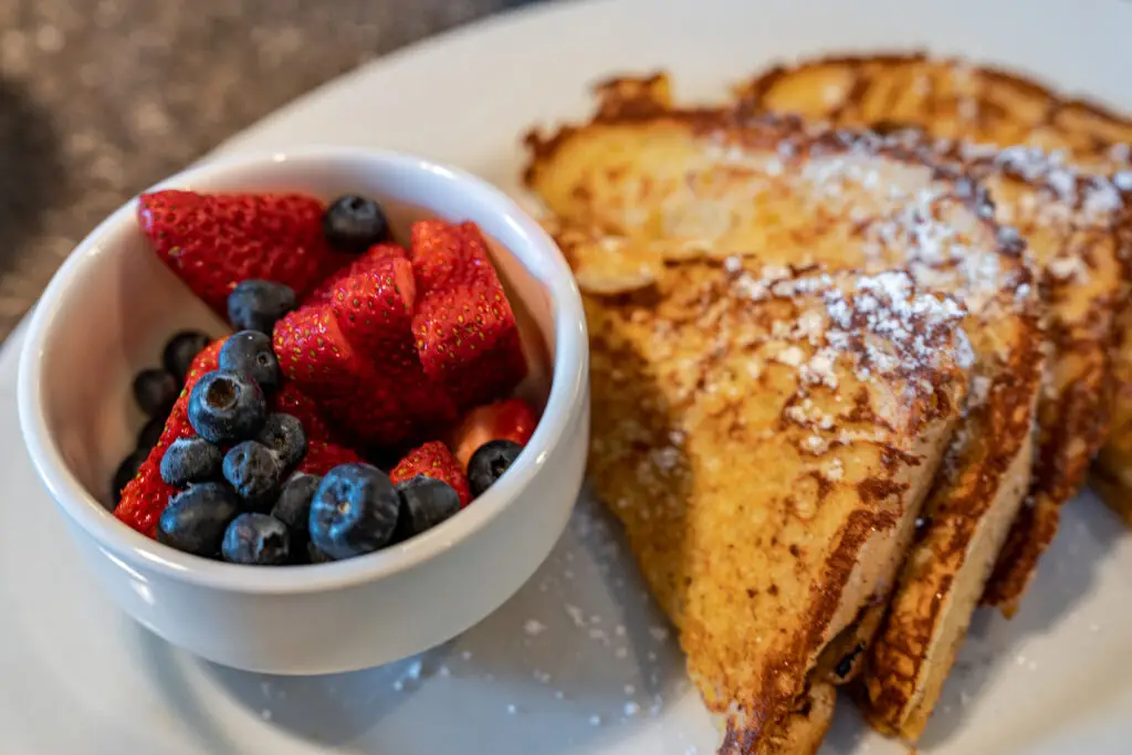 French Toast with a side of fresh mixed berries by 8th Street at the Ivy
